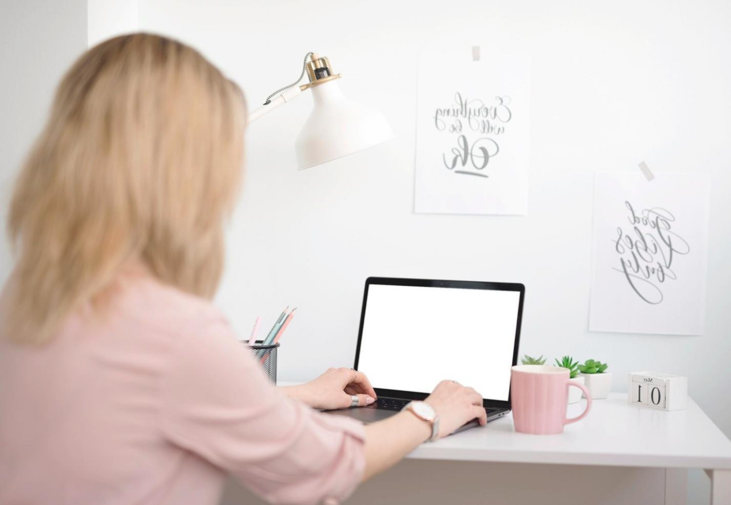 Financial professional analyzing market trends on computer screen with economic data visualization